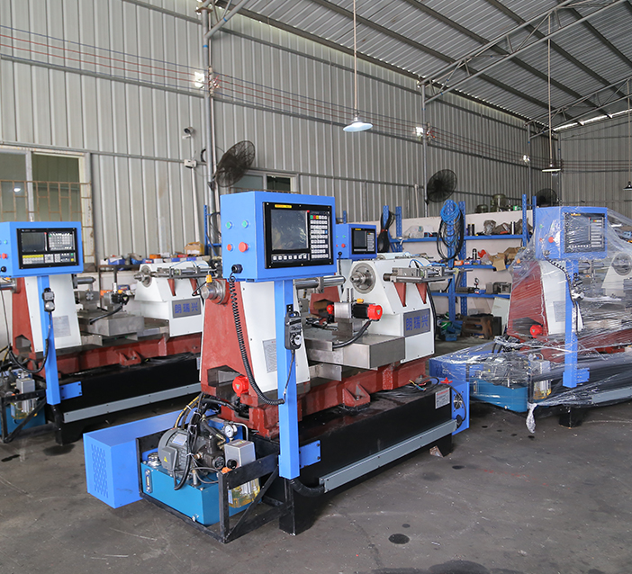 數(shù)控旋壓機 數(shù)控旋壓機